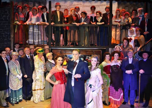 CAPTION:
The cast of Jekyll and Hyde - The Musical with (front) Katie Cowburn (Lucy), Peter Norris (Jekyll/Hyde) and Laura Corney (Emma).