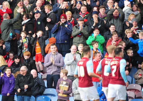Burnley fans celebrate the second goal against Derby County on Saturday