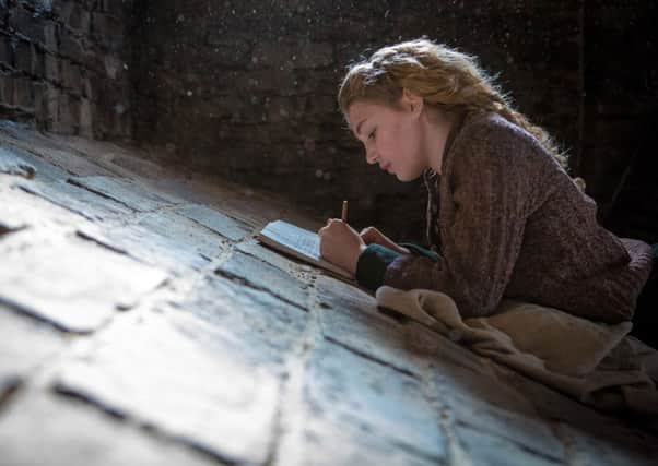 Undated Film Still Handout from The Book Thief. Pictured: Liesel (Sophie Nélisse).  See PA Feature FILM Film Reviews. Picture credit should read: PA Photo/Fox UK Film. WARNING: This picture must only be used to accompany PA Feature FILM Film Reviews.