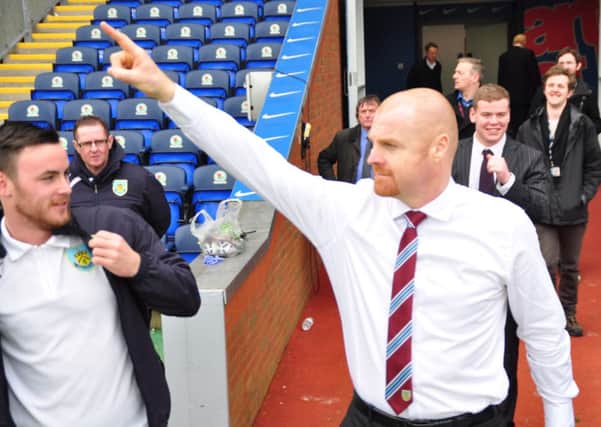 Sean Dyche salutes the Burnley fans at the final whistle