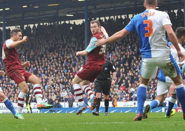 Rovers rattled: Danny Ings turns the ball home to earn Burnleys first win over Blackburn Rovers in 12 games