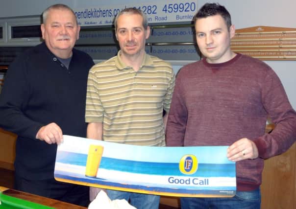 The draw was made by Clark, pictured right, along with , from left, organisers Trevor Sutcliffe and Andy Dibb