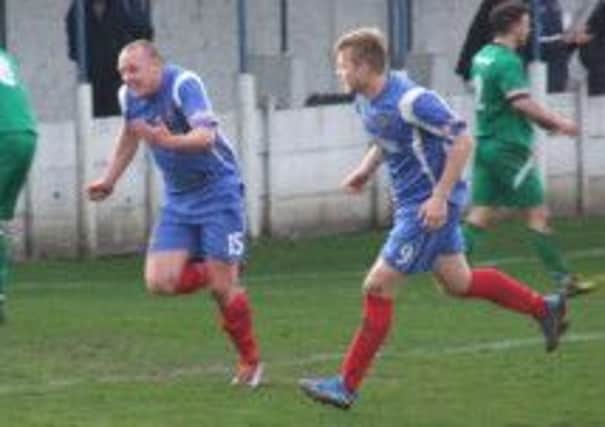 Sam Heap celebrates making the points safe with a late goal on Saturday. Picture: Peter Ryan