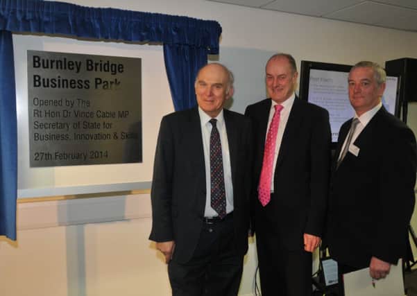 Business Secretary Vince Cable opens the new Burnley Bridge Business Park  with MP Gordon Birtwistle and Coun. Charlie Briggs.