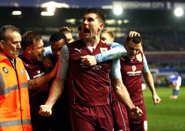 Sam Vokes celebrates putting Burnley 3-2 ahead
