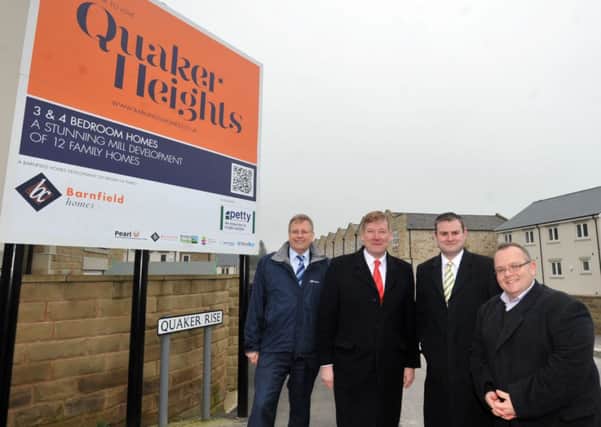 Government Housing Minister Kris Hopkins visits Quaker Heights, part of his tour of Pendle, from left, Pendle Council chief executive Stephen Barnes,Mr Hopkins, Pendle MP Andrew Stephenson and council leader Joe Cooney.