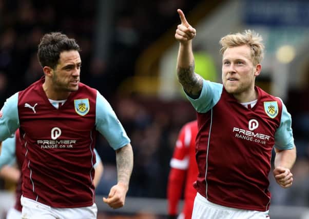 Great Scott: Scott Arfield celebrates his goal against Nottingham Forest with Danny Ings