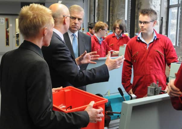 HRH Prince Andrew talks to students during his visit to UTC to offically open the new college.