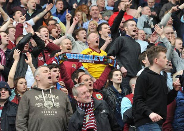 Burnley fans celebrate the final whistle at Ewood Park