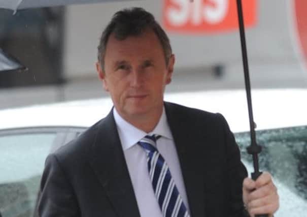 Pictured is MP Nigel Evans arriving at Preston Crown Court ahead of his ongoing trial for sexual assault and rape of several men.