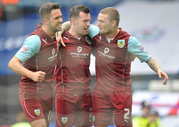 Close to a return: Danny Ings, left, and Keiran Trippier, right, with Ross Wallace after the recent win over Blackburn Rovers