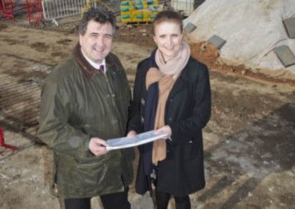 Colin Hirst and Rachel OConnor have the key to the door at the Low Moor Gardens development in Clitheroe