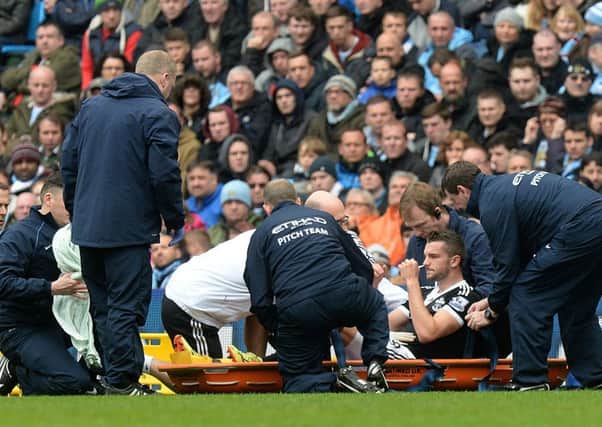 Injury blow: Jay Rodriguez is stretchered off at Manchester City
