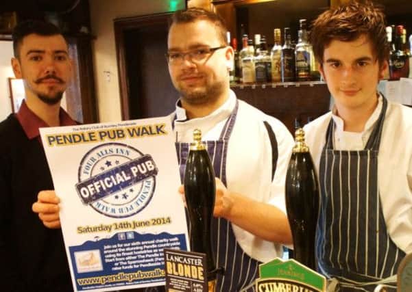 Danny Wroe, Matthew Reid and Connor Harrison from the Four Alls in Higham gearing up fornthe Pendle Pub Walk 2014