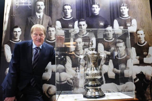 Photo: David Hurst 
Launch of a new exhibition commemorating Burnley FC's 1914 FA Cup win opened at Towneley Hall, Burnley Former Chairman of Burnley FC, Barry Kilby, with a replica of the cup