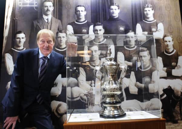 Photo: David Hurst 
Launch of a new exhibition commemorating Burnley FC's 1914 FA Cup win opened at Towneley Hall, Burnley Former Chairman of Burnley FC, Barry Kilby, with a replica of the cup