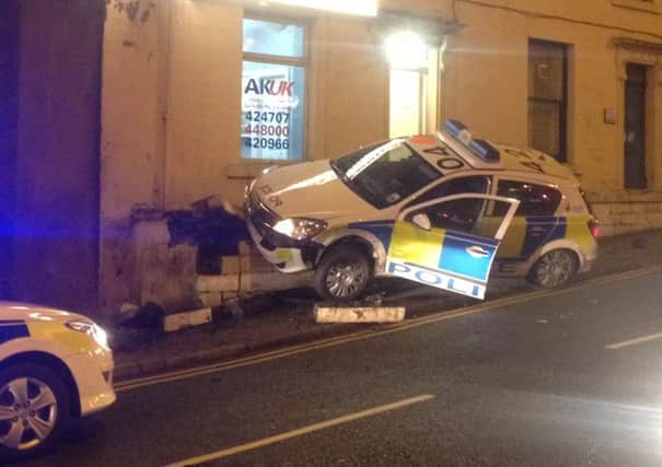 A police car which crashed in Burnley. (s)