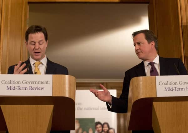 Prime Minister and leader of the Conservative Party, David Cameron, right, and Deputy Prime Minister and Liberal Democrats leader Nick Clegg (left). Photo: Alastair Grant/PA Wire