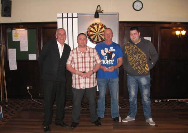 Burnley's Mick Taylor was beaten by St Helens' Michael Smith in the open darts final at Colne Legion
