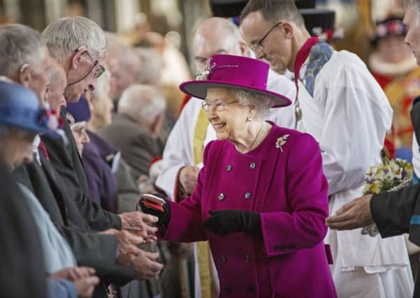 The Queen hands out Maundy Money at Blackburn Cathedral i during the traditional service.Photo: Jack Hill/The Times/PA Wire