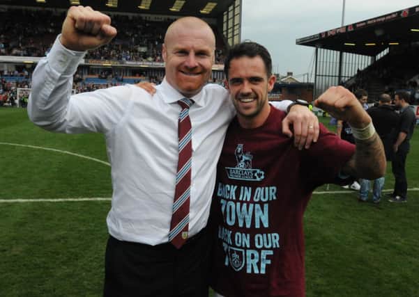 Sean Dyche celebrates promotion with leading scorer Danny Ings