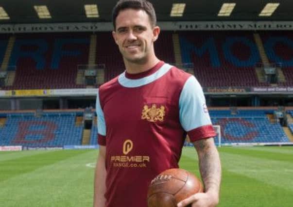 Danny Ings models the shirt which will be worn on Saturday against Ipswich Town