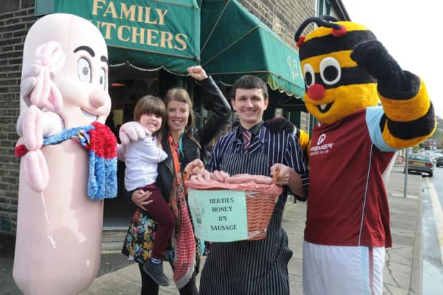 Mr Sausage and Bertie Bee with Danny Heys from Heys Butchers and Kirsty Horsfield with her nephew Euan Forrester and the 'Berties Honey B's Sausage' that she named.
