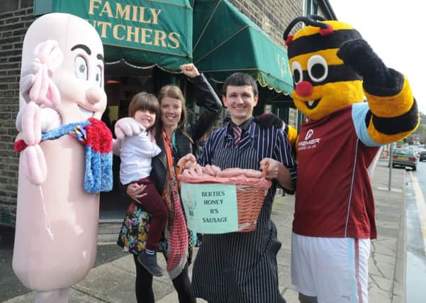 Mr Sausage and Bertie Bee with Danny Heys from Heys Butchers and Kirsty Horsfield with her nephew Euan Forrester and the 'Berties Honey B's Sausage' that she named.