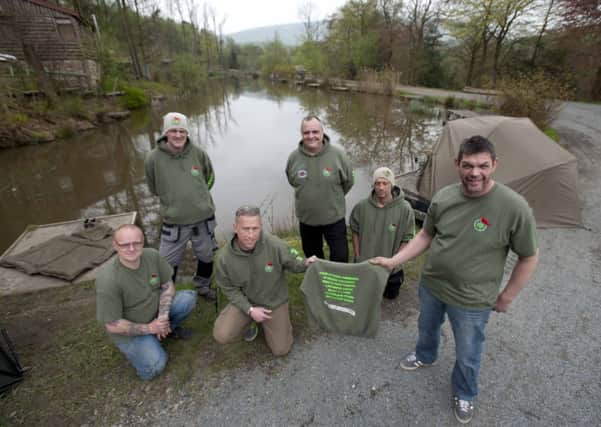 Fishermen, Boothman Park in Burnley, Keith Bailey, Darrell Howe, Simon Leigh, Howard Jackson, Neil Giltrow and Stephen Heap, who are to carp fish coast to coast for charity