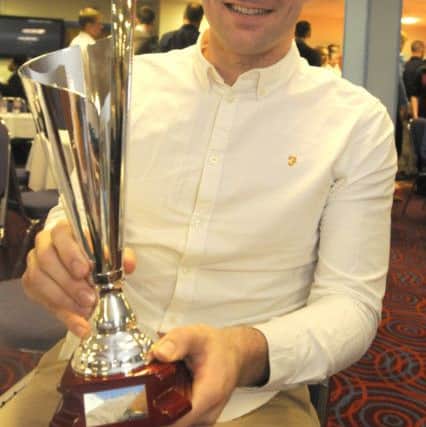 Sam Vokes with one of his many awards.
