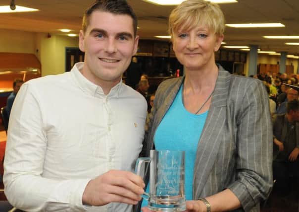 Top man: Sam Vokes collects his Player of the Year award from the Clarets Trust at Turf Moor on Tuesday night