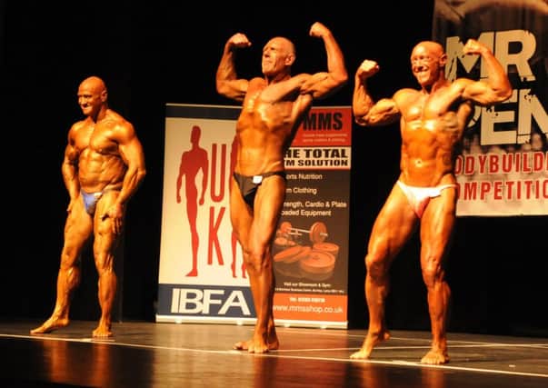 Competitors Steve Culshaw, Peter Hoy and Mark Waite at the Mr Pennine bodybuliding competition at Pendle Hippodrome.