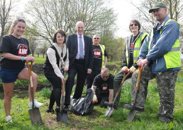 Jane Ellison MP, Minister for Public Health, with Gordon Birtwistle MP and  members of Red Rose Recovery Centre as they carry out work in Towneley Park.