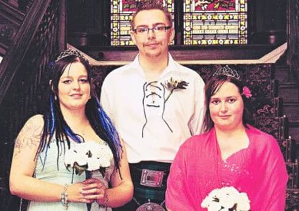 The late Adam Smith with his sister  Ashleigh (left) and Sandra. (S)
