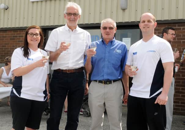 from left, Nicola Dinsdale, sports therapist, Brian Cookson, Nick Dinsdale, clinical director and Garth Spencer, personal trainer at the opening of NJD Sports Injury Centre in Clitheroe