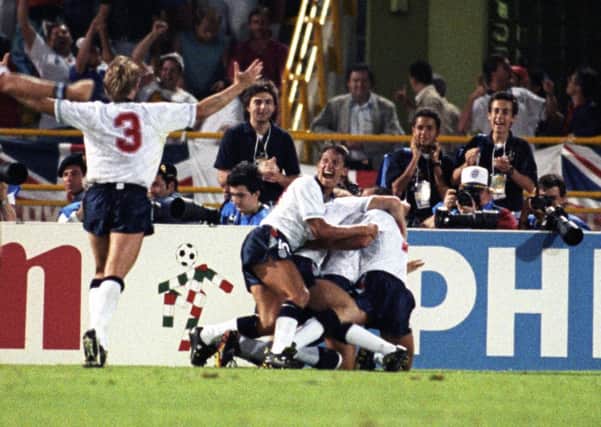 Golden moment: England players celebrate David Platt's last-gasp winner for England against Belgium at Italia 90