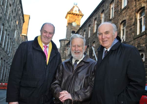 Business Secretary Vince Cable (right) at Brierfield Mills with Coun. John David (centre) and Burnley MP Gordon Birtwistle.