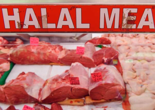 Butchers selling halal meat. Photo: Dominic Lipinski/PA Wire