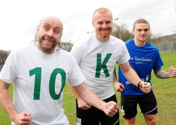 Jeff Brown is joined by Burnley FC manager Sean Dyche and player Kieran Trippier to launch the Pennine 10K race.
Photo Ben Parsons