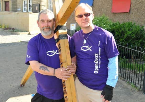 Vince Welland and Rev. Phil Ingram with their 10ft cross before they set off on their 24 hour walk.