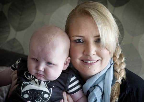Four-month-old Charlie Bell from Nelson, who suffers from Aniridia, an absence of the iris and his auntie Kirsty Brunskill. Photo Ian Robinson