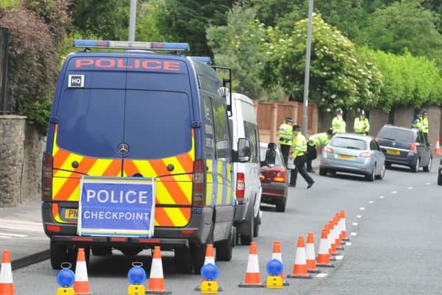 Police carry out Operation Monaco at the checkpoint on Padiham Road.