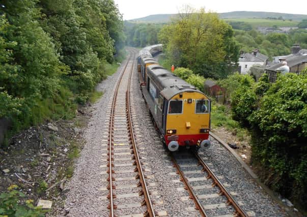 Photo: David Evans.First train on recently completed Todmorden Curve