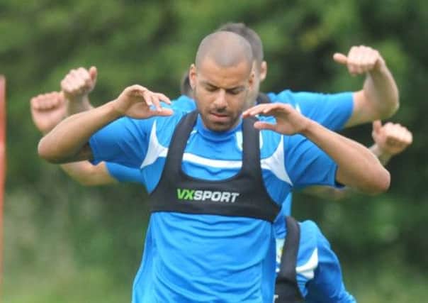 New face: Steven Reid joins in training on his first day at Gawthorpe on Monday