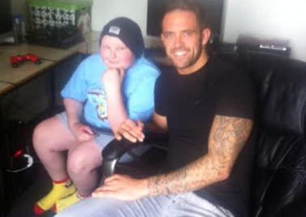 Lewis Taylor with his Clarets hero Danny Ings