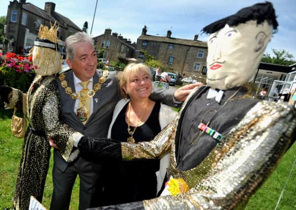 The Mayor and Mayoress of Pendle, councillor Graham Roach and Joanna Sagar, take a look at the scarecrows at Trawden Garden and Scarecrow Festival