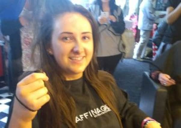 Grace Agnew, who cut her hair to raise money for the Little Princess Trust. (s)