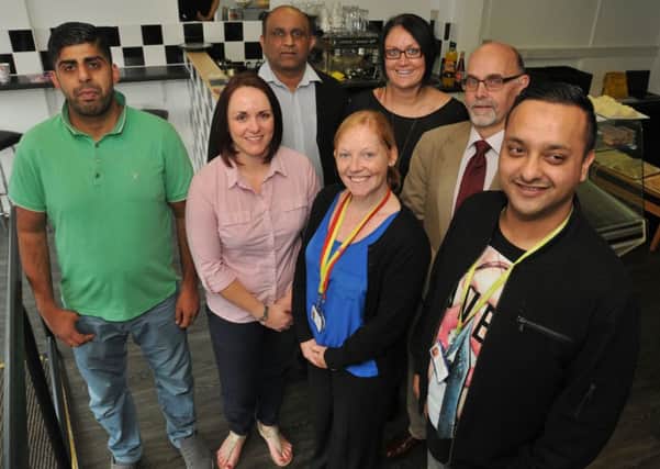 OPENING: Ikram Khan, Rachael Taylor, Naheed Ashraf, Jackie McVan, Kerry Stewart, Bob Allen and Mubashir Khan at the opening of the Ehaas Health and Wellbeing cafe at the Cornerhouse.