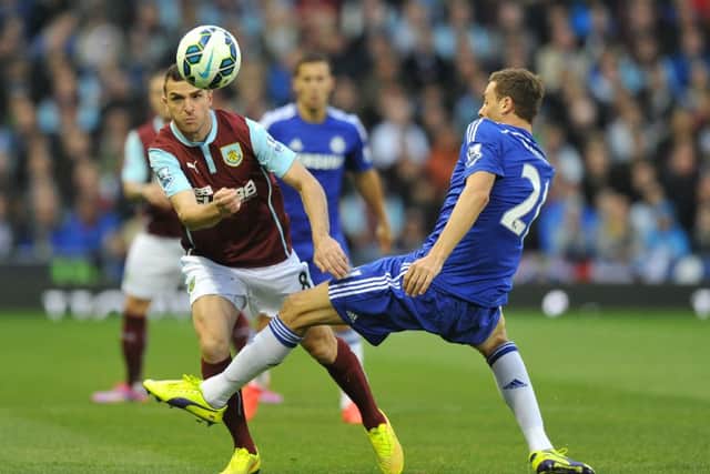 Burnley's Dean Marney is fouled by Chelsea's Nemanja Matic

Photographer Dave Howarth/CameraSport

Football - Barclays Premiership - Burnley v Chelsea - Minday 18th August 2014 - Turf Moor - Burnley

© CameraSport - 43 Linden Ave. Countesthorpe. Leicester. England. LE8 5PG - Tel: +44 (0) 116 277 4147 - admin@camerasport.com - www.camerasport.com