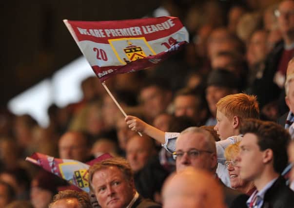 A flag in the crowd 

Photographer Dave Howarth/CameraSport

Football